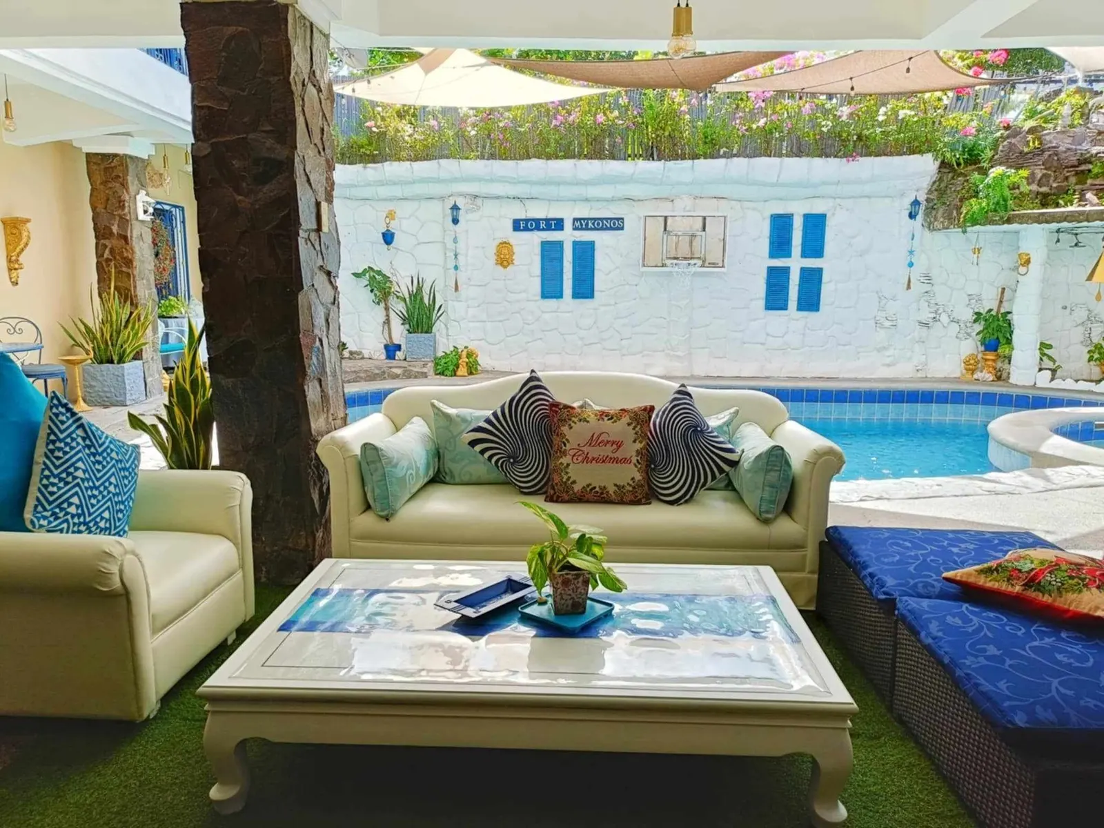 The poolside lounge by the blue shutters