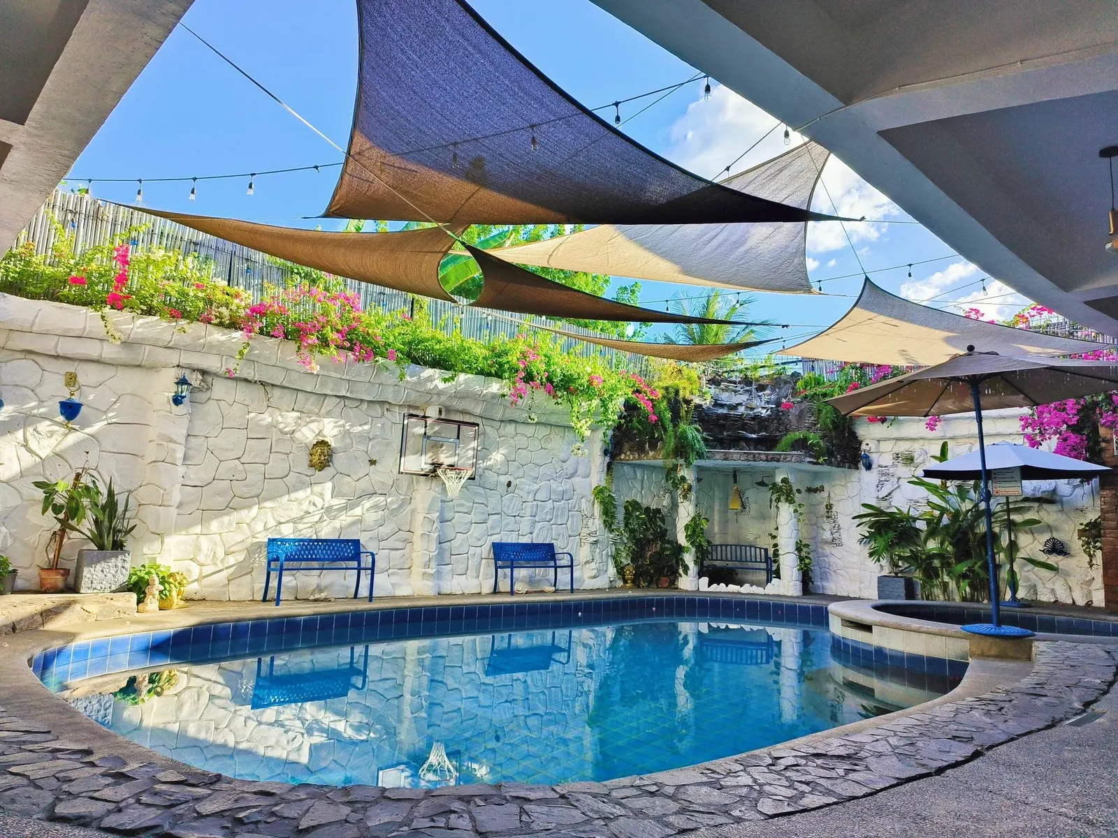 The adult pool under shade sails